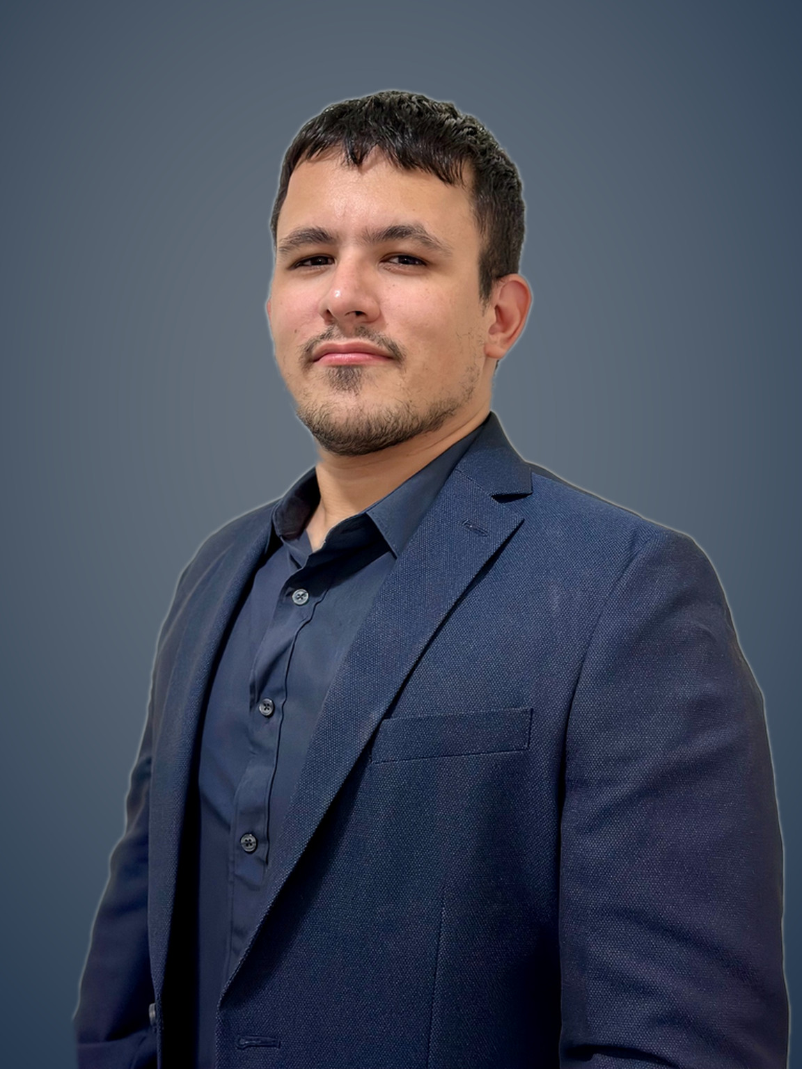 Sahlo Ravinovich in a navy blazer